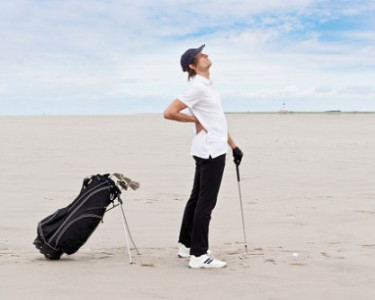 Should I play golf with a sore back?