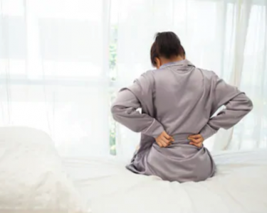 Why do I get lower back pain when I am menstruating?